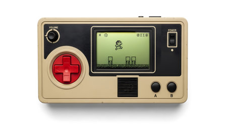 Showing retro portable handheld game console with pixelated game display. resolution...