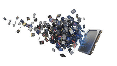 Showing data transfer concept with micro sd cards flowing into hard drive. resolution...