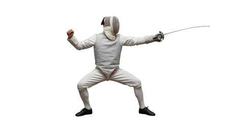 A fencer in a white uniform and mask holds a foil sword in an pose with one fist clenched on a...