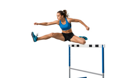 Black showing female athlete in blue and black shorts jumping over hurdle on white background....の写真素材