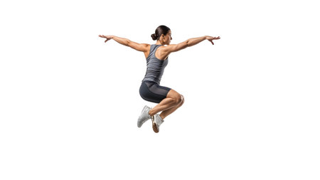 showing female athlete in mid-air jump pose on white background. resolution