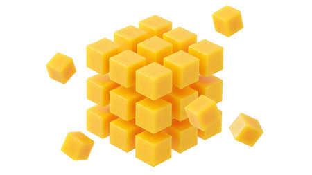 A cube structure made of yellow cubes appears to be exploding outwards on a clean white...