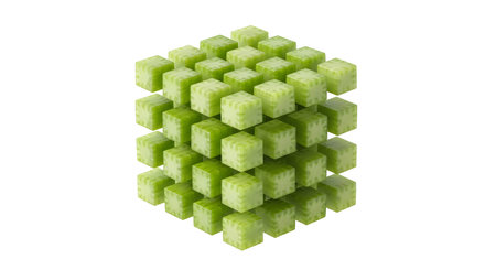 Diced showing 3d cube formation of small green diced vegetable cubes on a white background.
