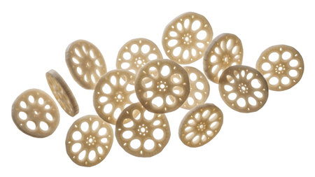showing sliced lotus root rounds floating against a white background. resolution...