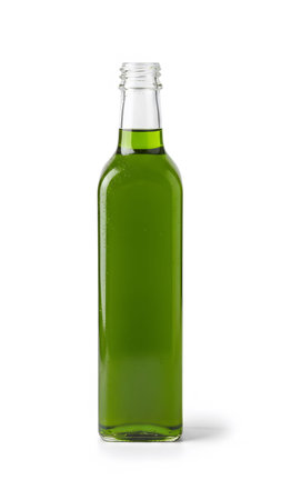 A tall, transparent glass bottle filled with bright green liquid, isolated on a white background.