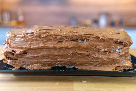 The process of making a chocolate cake with nuts and cream. cooking at home.