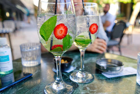 Exotic cocktail with strawberries and mint in a greece restaurant. close upの写真素材