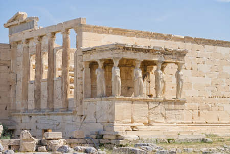 Figures of the Caryatid Porch of the Erechtheion on the Acropolis at Athens. Sunny day no people. close upの写真素材