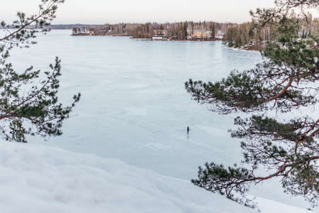 skating on frozen lake