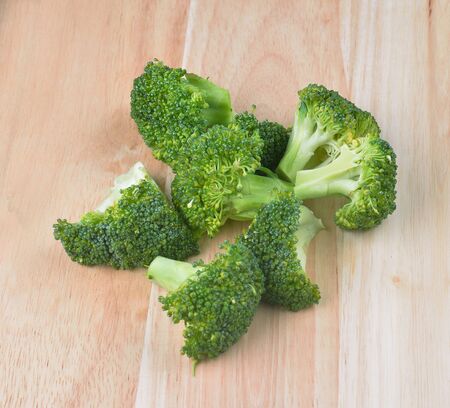Fresh broccoli on the wooden tableの写真素材