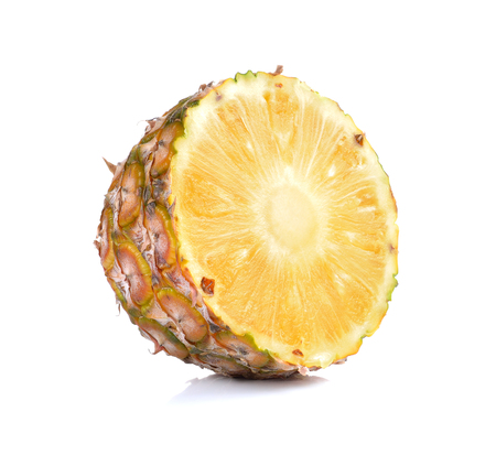 Slice of ripe pineapple isolated on whiteの写真素材
