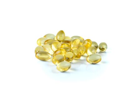 Fish oil capsule isolated on a white background