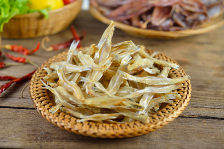 dried  fish on wood background