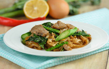 Stir-fried Noodles with pork and  chinese broccoli  in Sweet Soy Sauceの写真素材