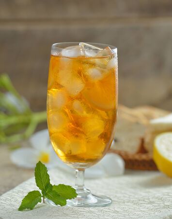 cups of tea with mint on wooden tableの写真素材