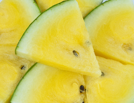 Yellow watermelon  slicedの写真素材