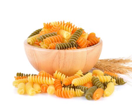 Dry organic pasta on white backgroundの写真素材
