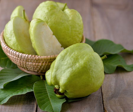 Fresh guava on wooden backgroundの写真素材