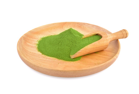 powder green tea isolated on white backgroundの写真素材