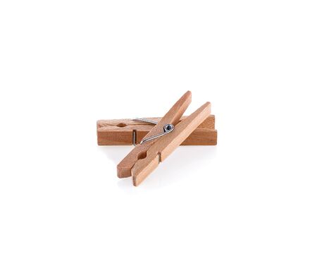 wooden cloth pegs on white backgroundの写真素材