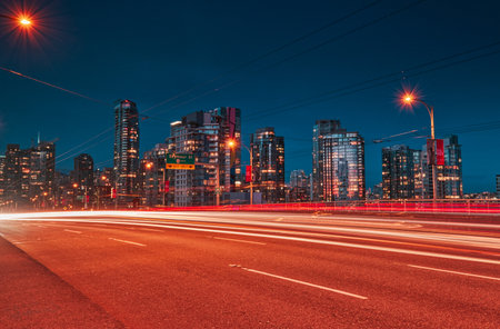 Vancouver, MAY 05 2019: Downtown Vancouver BC, Canada. Long exposure from Granville bridge Buildings in backgroundのeditorial素材
