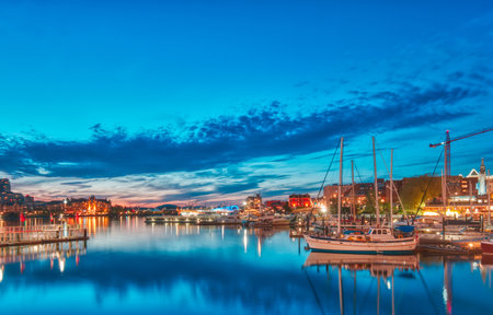 VICTORIA, BC, MAY 08 2019: Downtown Victoria, Canada. Night scene of the harbour in downtown victoria, british columbia, canadaのeditorial素材