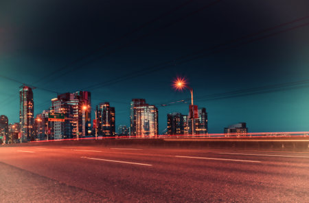 Vancouver, MAY 05 2019: Downtown Vancouver BC, Canada. Long exposure from Granville bridge Buildings in backgroundのeditorial素材