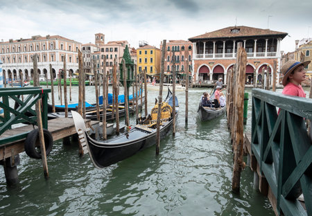 Venice, Italy - June 30, 2017: A view of the colorful Venetian houses, Gondola in a canal in Venice in Venice, Italyのeditorial素材