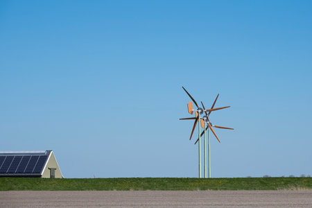 Groningen, the Netherlands - April 29 2020: Small wind turbines with wooden blades of EAZ Twelve...