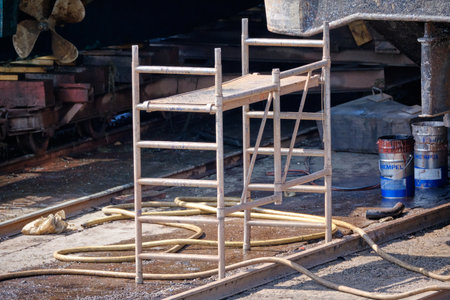 Urk, The Netherlands - June 15 2020 Abandoned jetty on a shipyard, repair material next to the jetty. Symbol of marine marine sails and naval fleet. The Netherlands.のeditorial素材