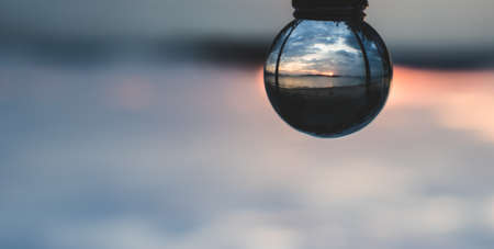 crystal ball beach, Inside is the sun setting.の写真素材