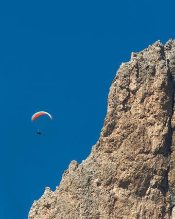 Paragliding onto the rocksの写真素材