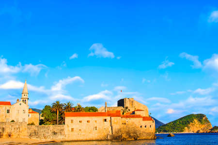 Beautiful view of the old town of Budva and the bell tower. John in Budvaの写真素材