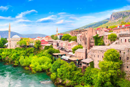 Beautiful view of the Karadjozbegov mosque jamia on the banks of the Neretva River in Mostar, Bosnia and Herzegovinaの写真素材