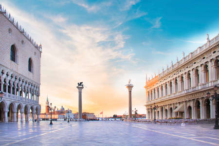 The beautiful view of the Doge's Palace, the Marcian Library, the column of the Saint Mark and the Column of Saint Theodore and the Piazza San Marco in Venice, Italyの写真素材