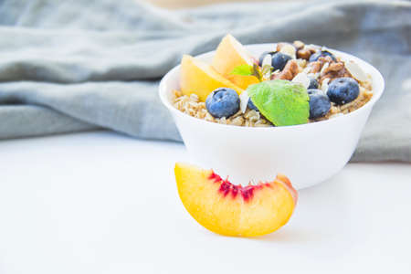 Oatmeal porridge with blueberries. Superfood for healthy nutritious breakfastの写真素材