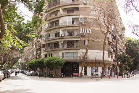 CAIRO, EGYPT - DECEMBER 29, 2021: View of a busy street in the Zamalek district of downtown Cairo in Cairo, Egyptのeditorial素材