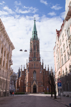 Church of St. Gertrude on the streets of Riga, Latvia on a sunny day