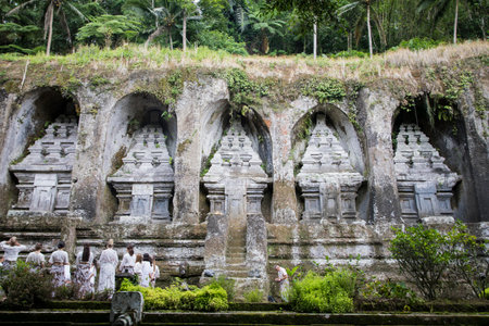 Beautiful view of Gunung Kawi Tampaksiring and ritual in Ubud, Bali Island, Indonesiaの写真素材
