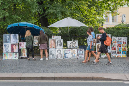 Saint Petersburg, Russia - August 22, 2020: street portraitists' shops with the artwork along the pavement of Nevsky Prospect.のeditorial素材