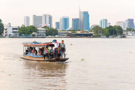 Bangkok, Thailand - September 25, 2018: commuters cross the Chao Phraya River on the ferry following from Khlong Toei to Bang Krachao.のeditorial素材