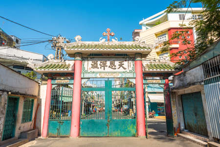 Ho Chi Minh City, Vietnam - April 15, 2019: the entrance gate to the territory of Cha Tam Church (St. Francis Xavier Parish Church). A must-see of Cho Lon (Chinatown of Saigon).のeditorial素材