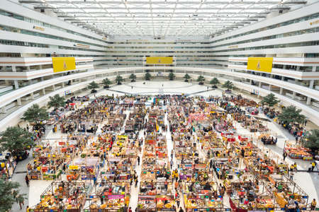 Bangkok - July 11, 2019: the main hall of Chaeng Watthana Government Complex occupied by a food and clothing market. The complex houses multiple Thailand government ministries, departments, offices.のeditorial素材
