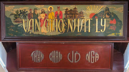 Da Nang, Vietnam - March 25, 2019: a painting that depicts Jesus Christ, Buddha, Laozi, Confucius & Muhammad in Trung Hung Buu Toa Cao Dai, a Caodaist temple. Cao Dai combines world religions into oneのeditorial素材