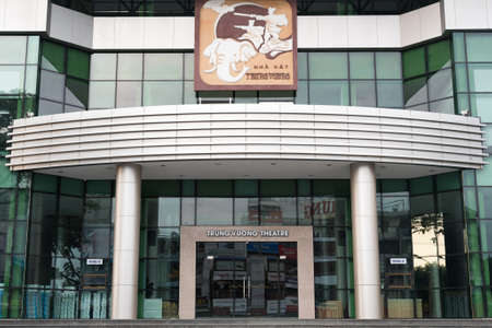 Da Nang, Vietnam - March 14, 2019: Trung Vuong Theater, an exterior with neighboring buildings reflected in the glass.のeditorial素材