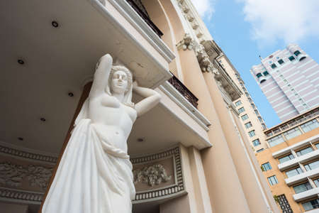 Ho Chi Minh City, Vietnam - April 7, 2019: a nude woman statue of the facade of Saigon Opera House. The building is one of the main tourist attractions of the city.のeditorial素材