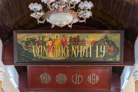 Da Nang, Vietnam - March 25, 2019: an interior of Trung Hung Buu Toa Cao Dai, a Caodaist temple, with a painting that depicts Jesus Christ, Buddha, Laozi, Confucius and Muhammad.のeditorial素材