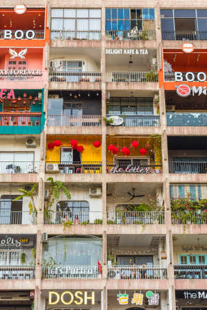 Ho Chi Minh City, Vietnam - February 18, 2019: the Cafe Apartment, a multistory residential building on Nguyen Hue Street turned into a cafes' hub.のeditorial素材