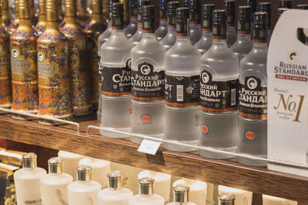 Istanbul, Turkey - April 25, 2018: one-liter bottles of vodka Russian Standard with a price tag "17,50 â¬" on a shelf of a duty free shop in Istanbul Ataturk Airport.のeditorial素材