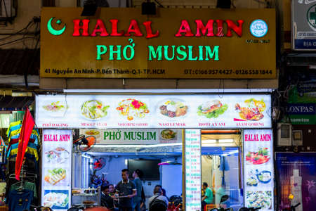Ho Chi Minh, Vietnam - April 27, 2018: Halal food restaurant "Halal Amin - Pho Muslim" with the sign announces a halal version of soup pho. Many Muslim travelers from Malaysia & Indonesia visit city.のeditorial素材